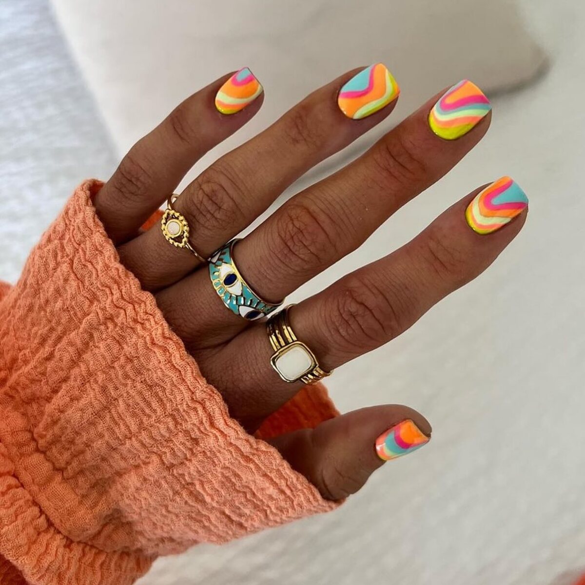 3. Groovy Rainbow Swirls for a Retro Vibe