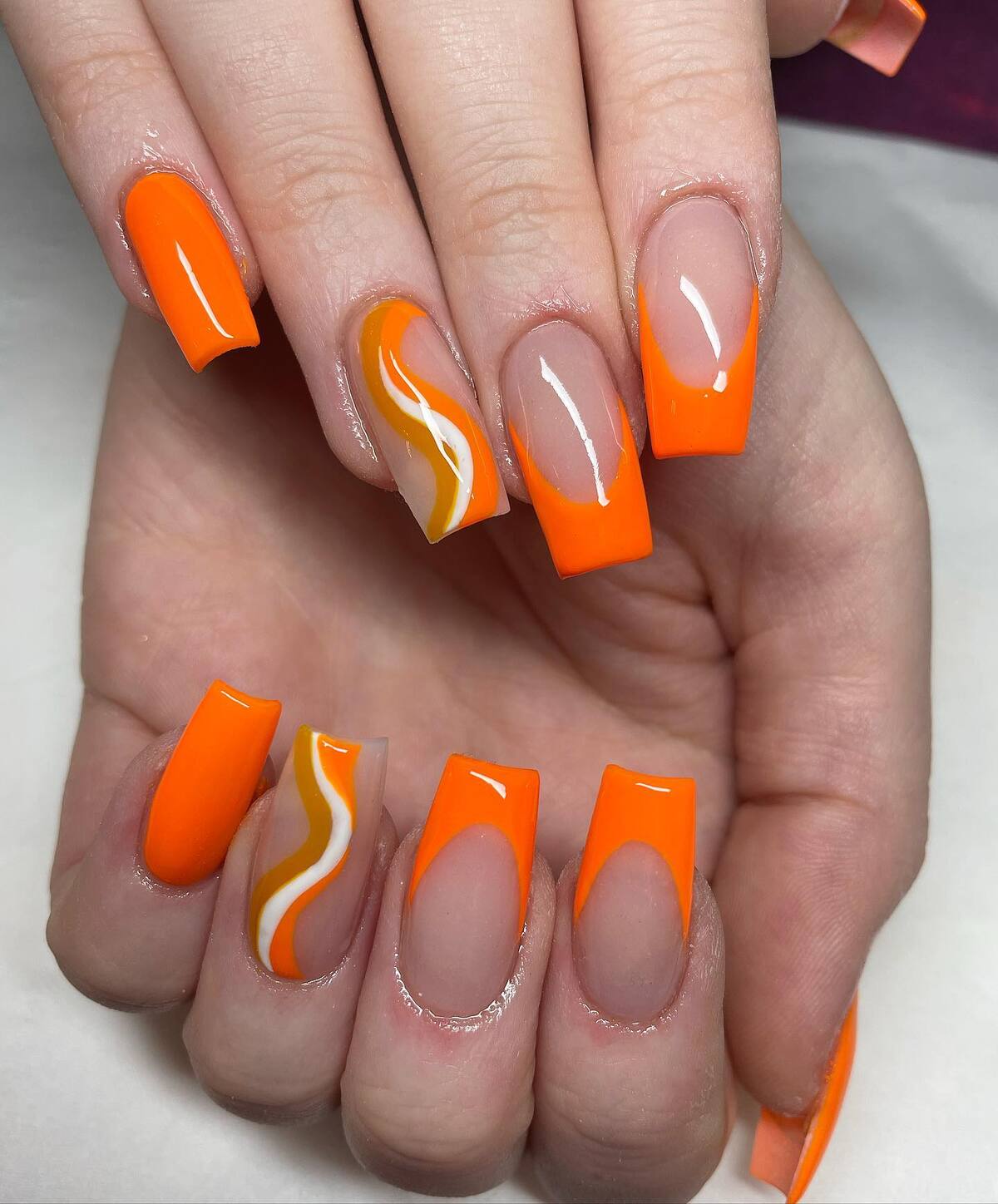 6. Vibrant Orange with Swirling Accents