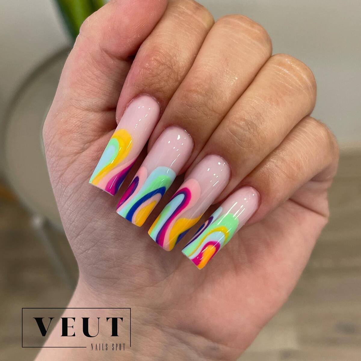 8. Rainbow Watercolor Swirls on Nude Base