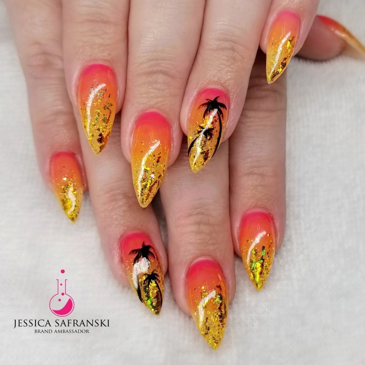 11. Golden Sunset with Palm Tree Silhouettes