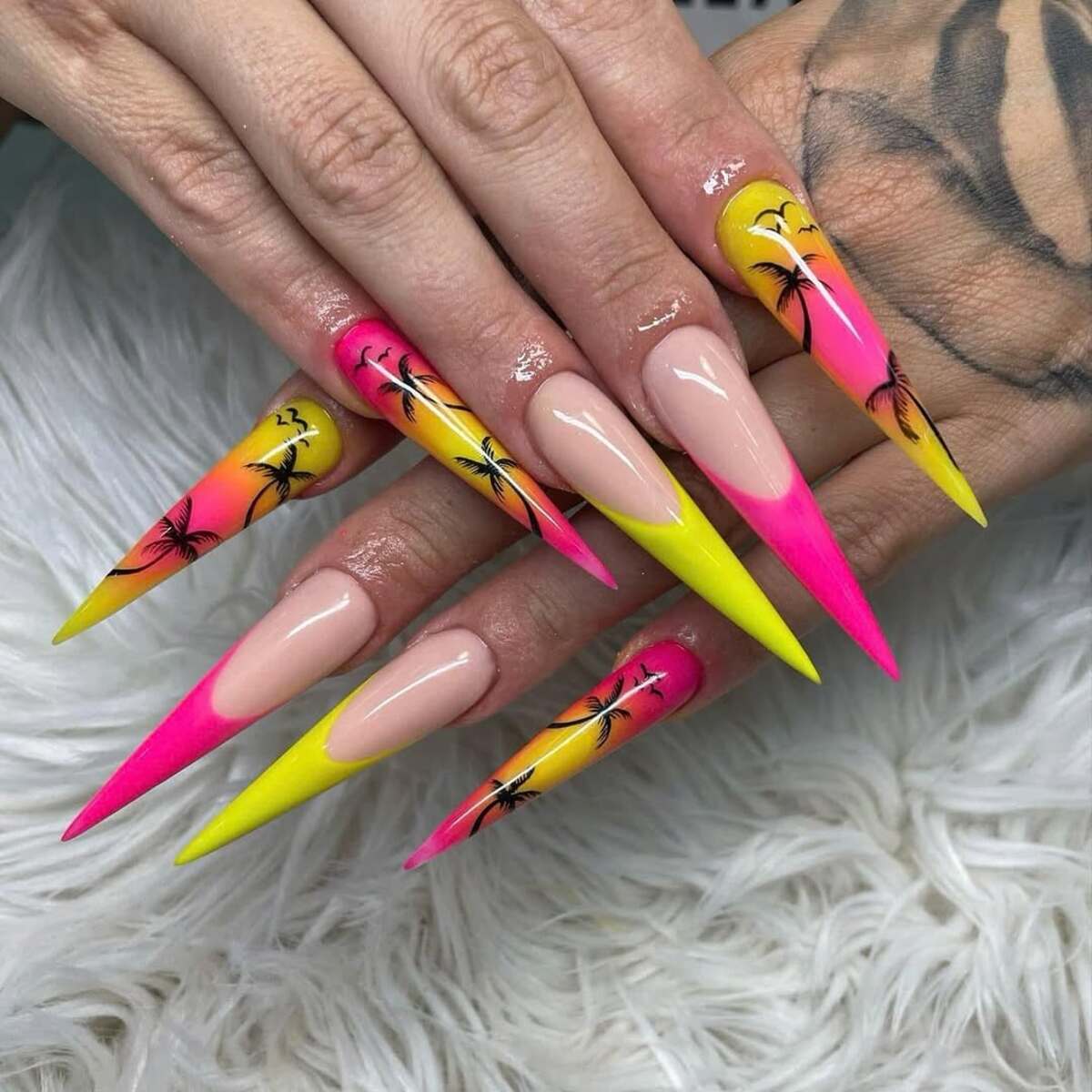 23. High-Contrast Sunset Stiletto Nails