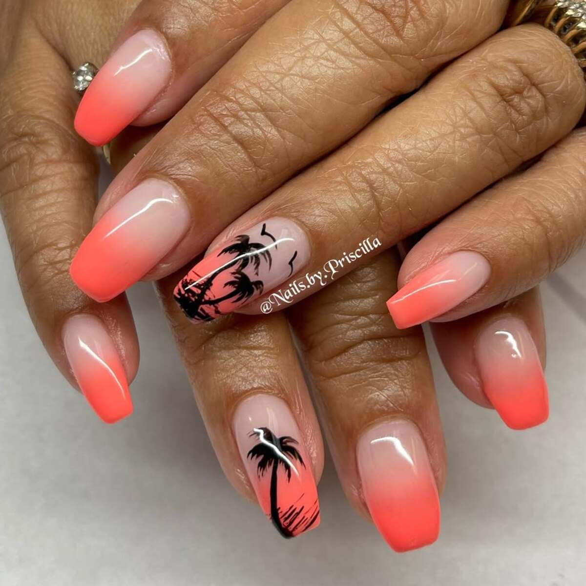 10. Ombre Sunset with Palm Silhouettes