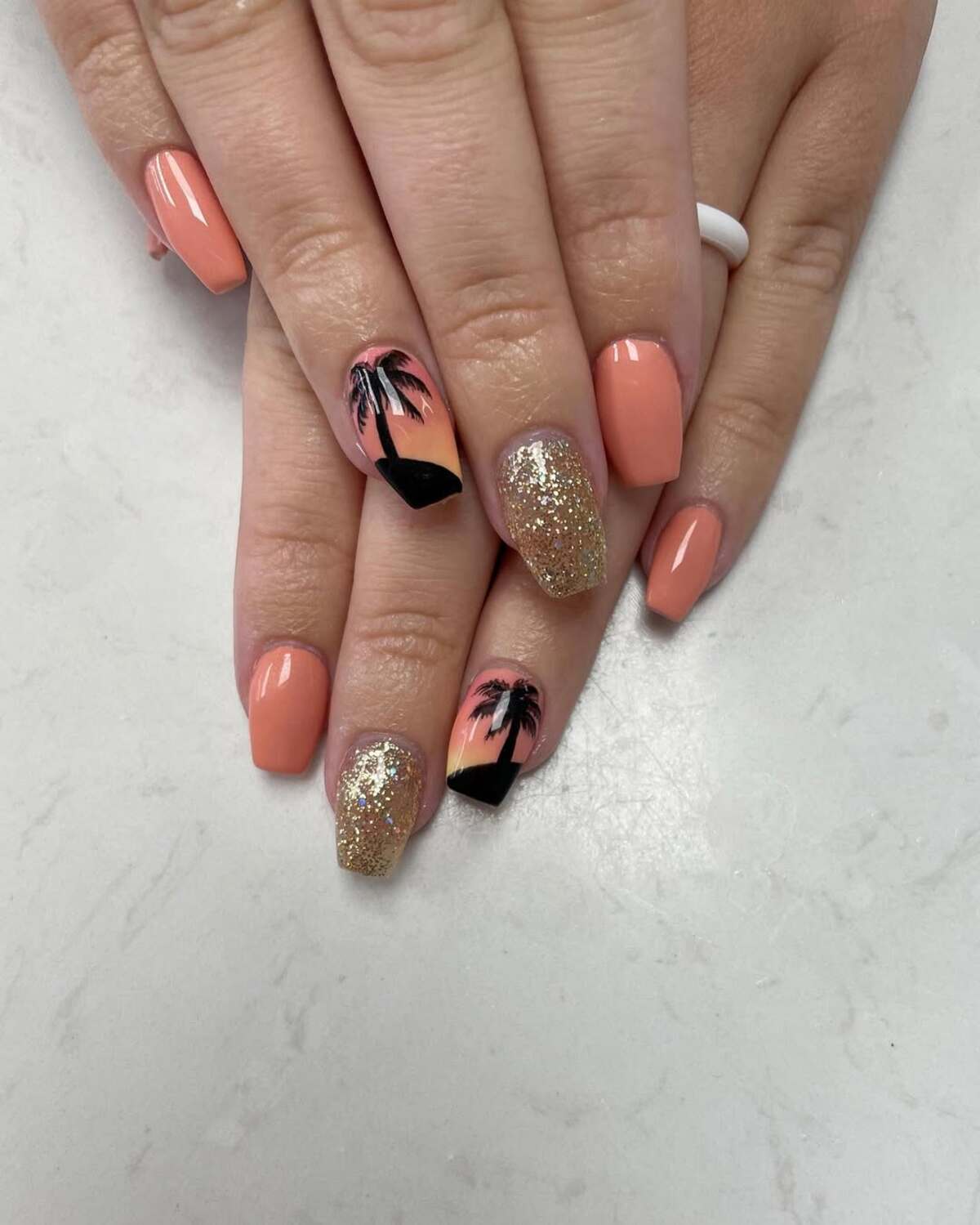 23. Dreamy coral and Gold Sunset Nails with Palm Trees