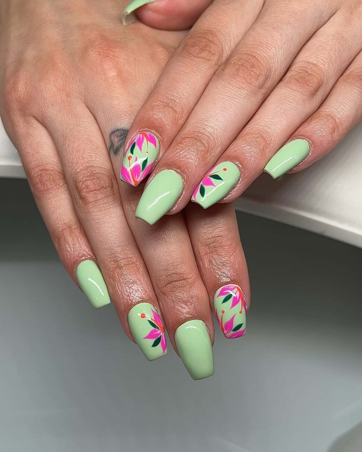 3. Mint Green with Bold Tropical Florals