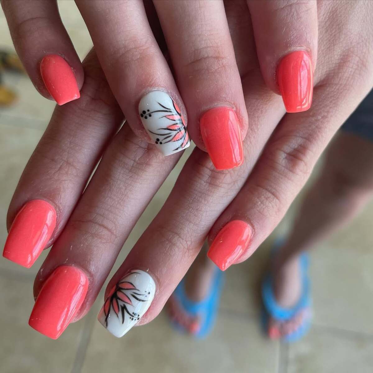 8. Coral Elegance with Minimalist Floral Art