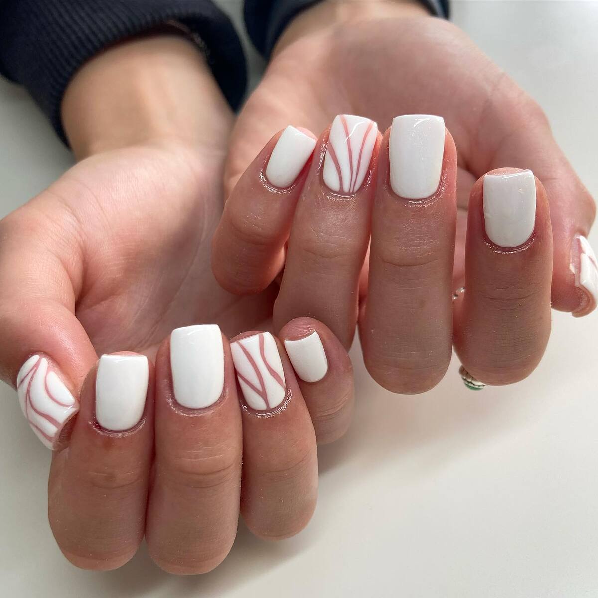 15. Chic White Nails with Minimalist Red Lines