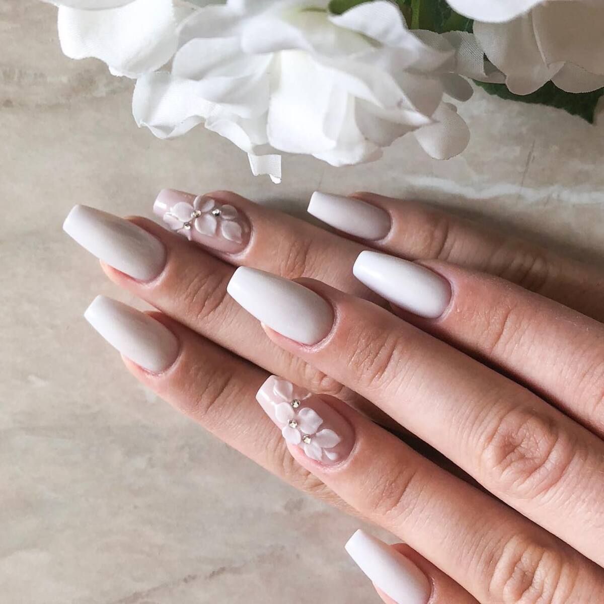 2. Minimalist Matte White with Floral Details