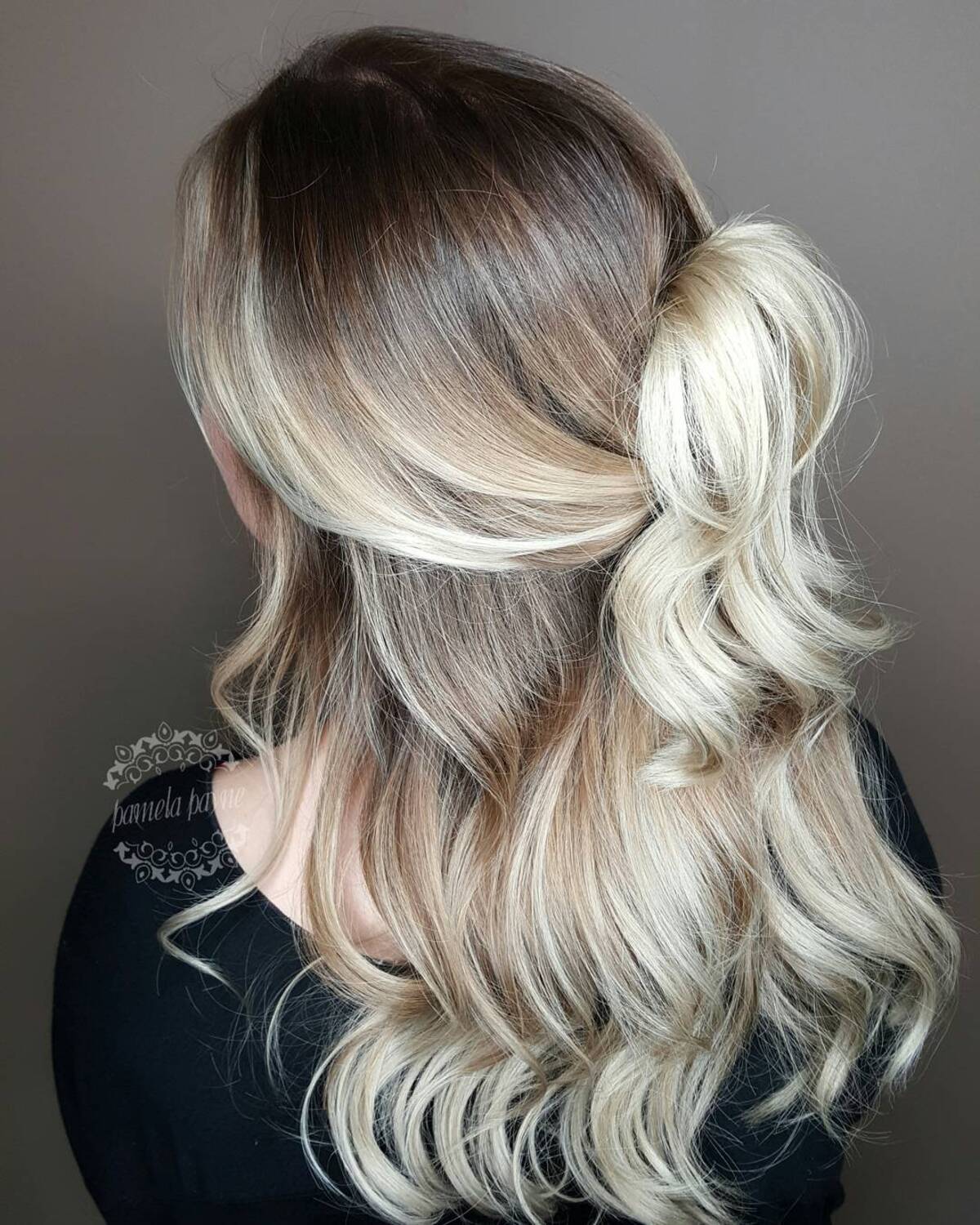11. Frosted Blonde Ombre with Elegant Half-Up Twist