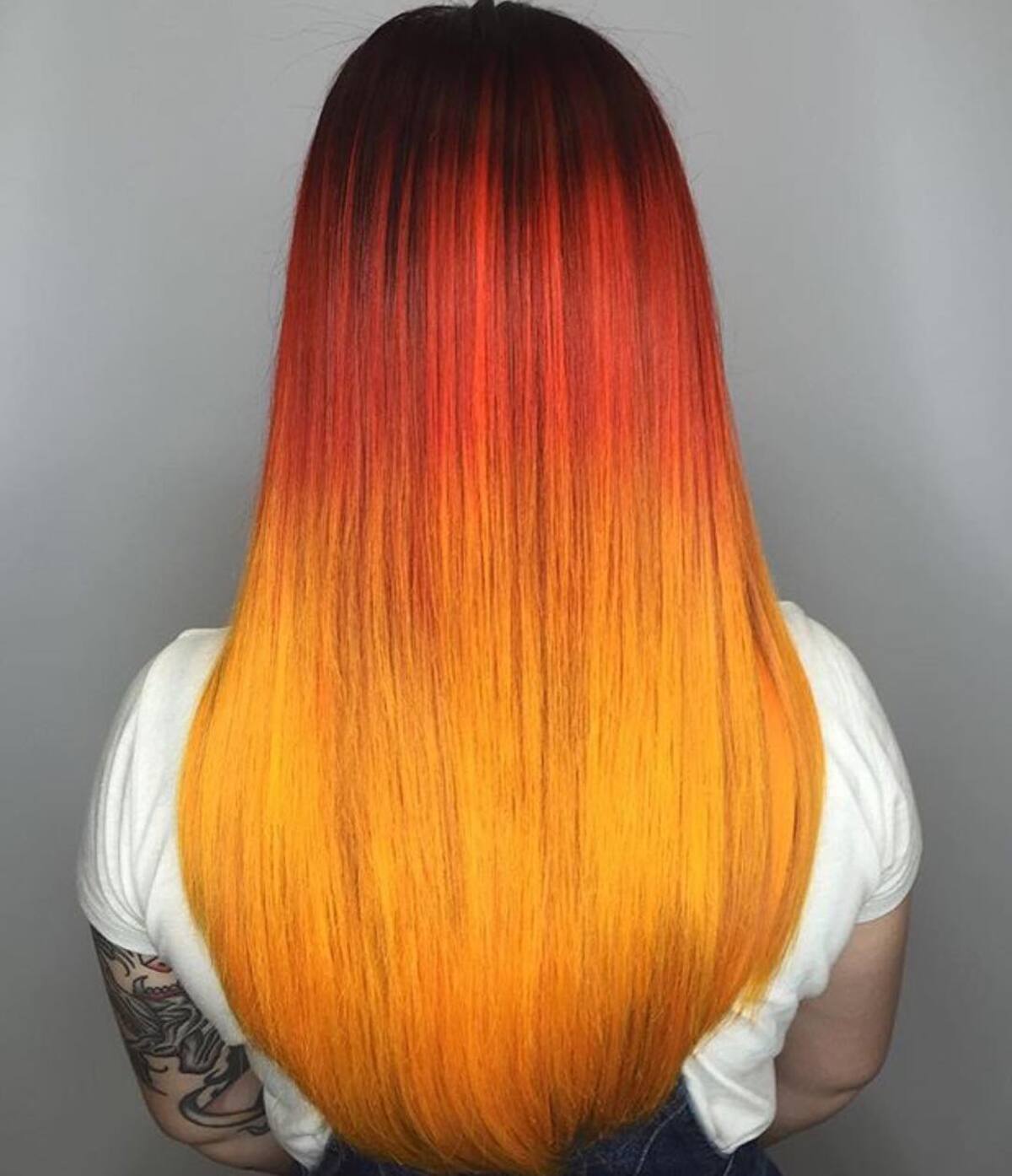 18. Fiery Sunset Ombre with Sleek Straight Finish