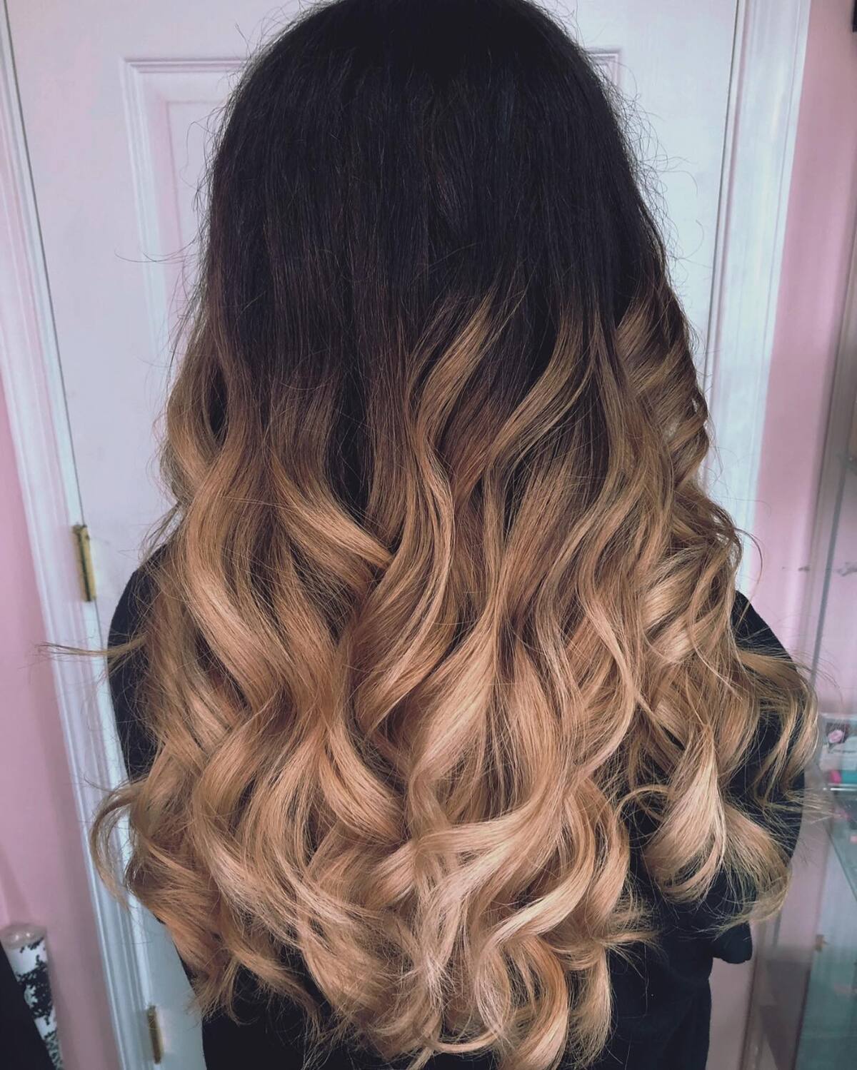 19. Dark Rooted Golden Caramel Ombre with Voluminous Curls