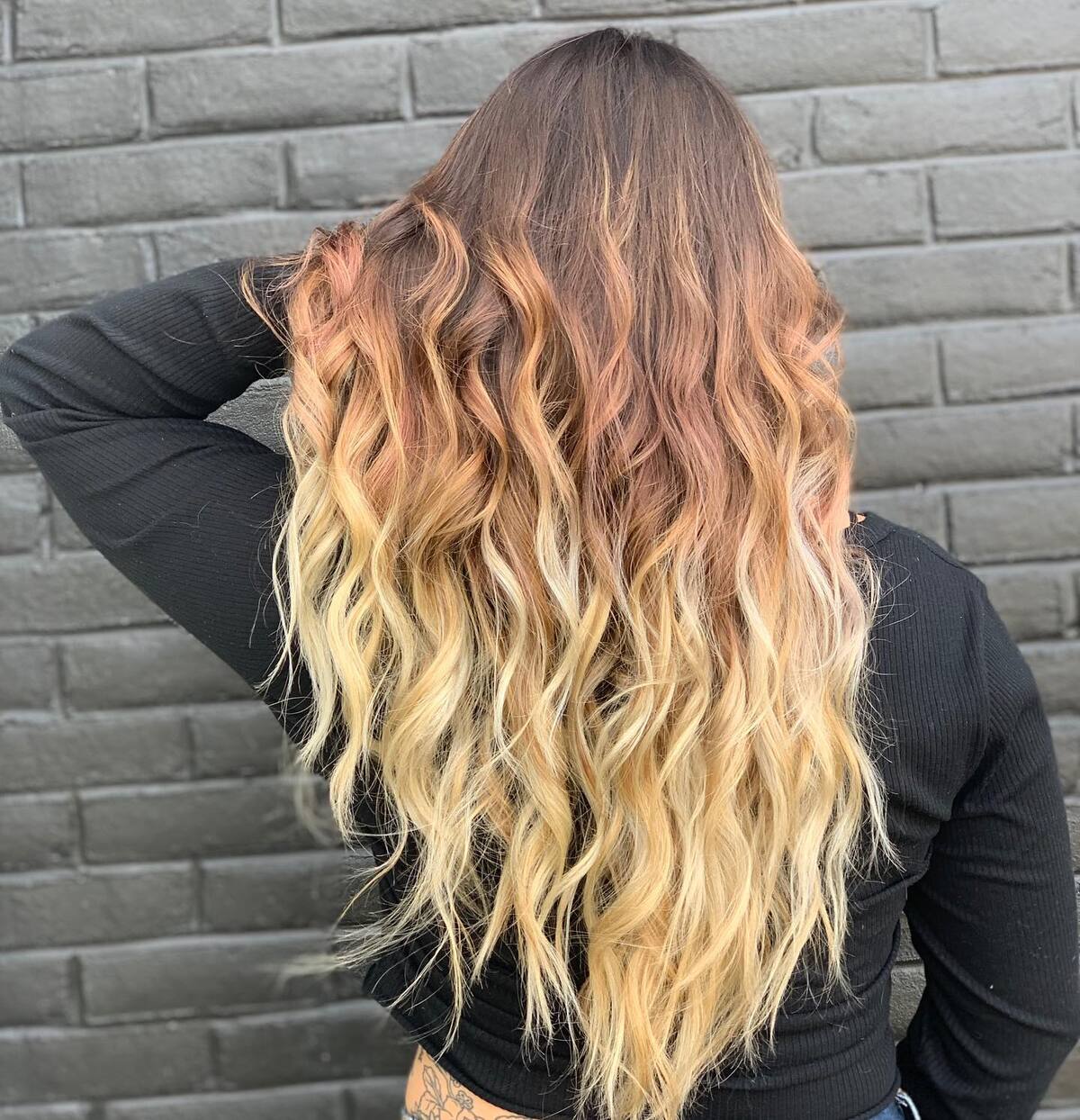 25. Rooted Rose Gold to Vanilla Blonde Ombre with Beachy Waves
