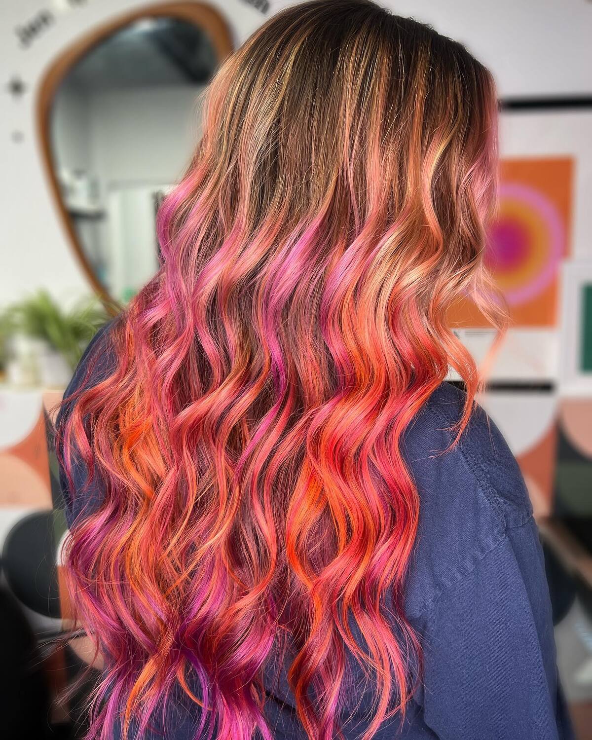 27. Vibrant Neon Ombre with Hot Pink and Orange Waves