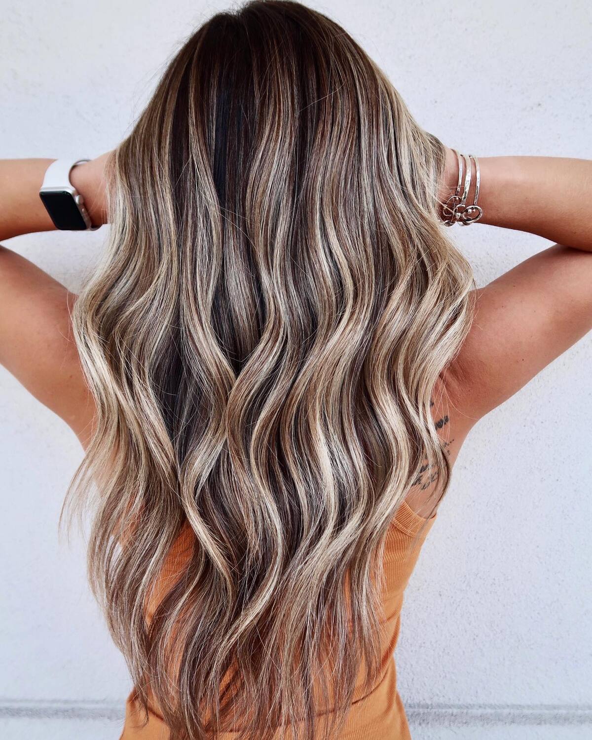 28. Cool-Toned Bronde Ombre with Soft Dimensional Waves