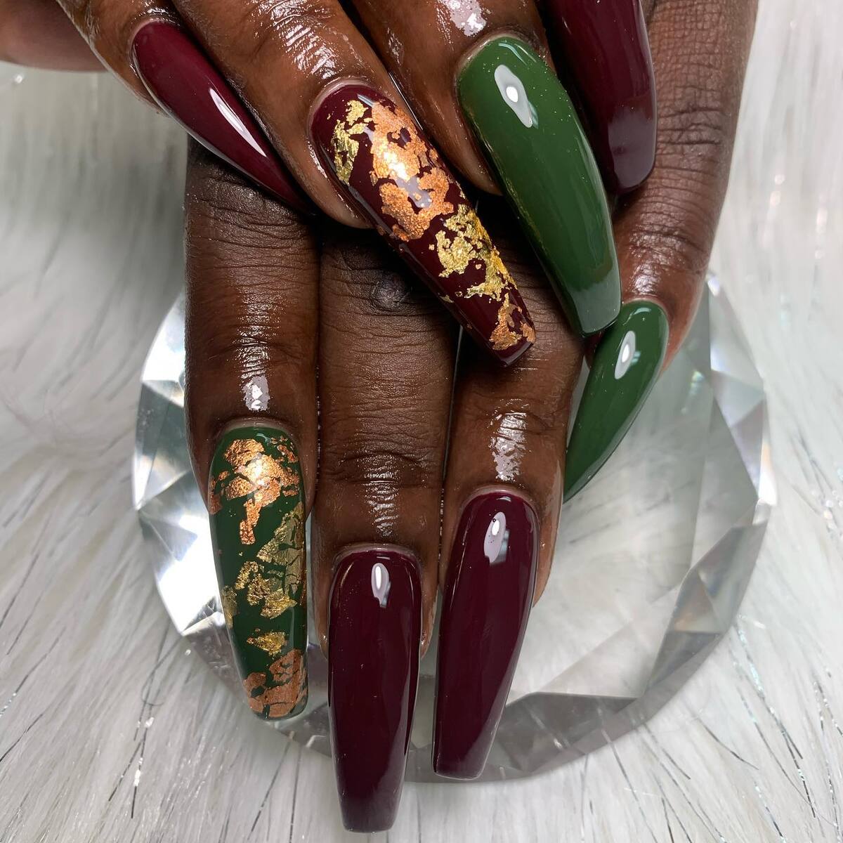 2. Autumn Jewel Tones with Gold Leaf Glam