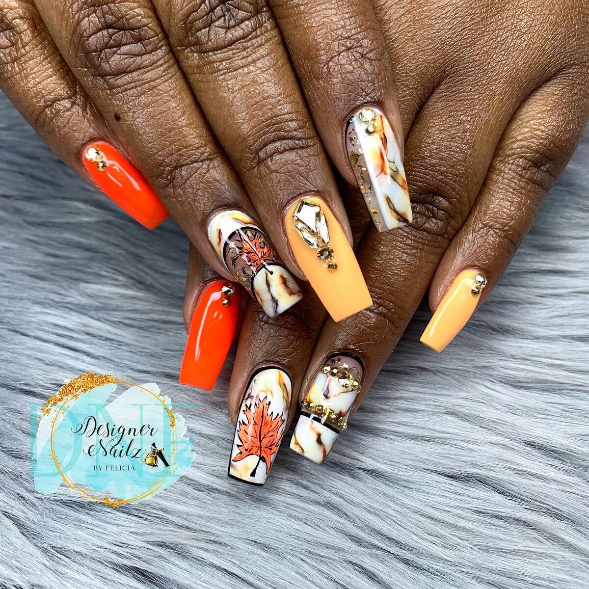 24. Marble Maple Elegance with Gold Glam
