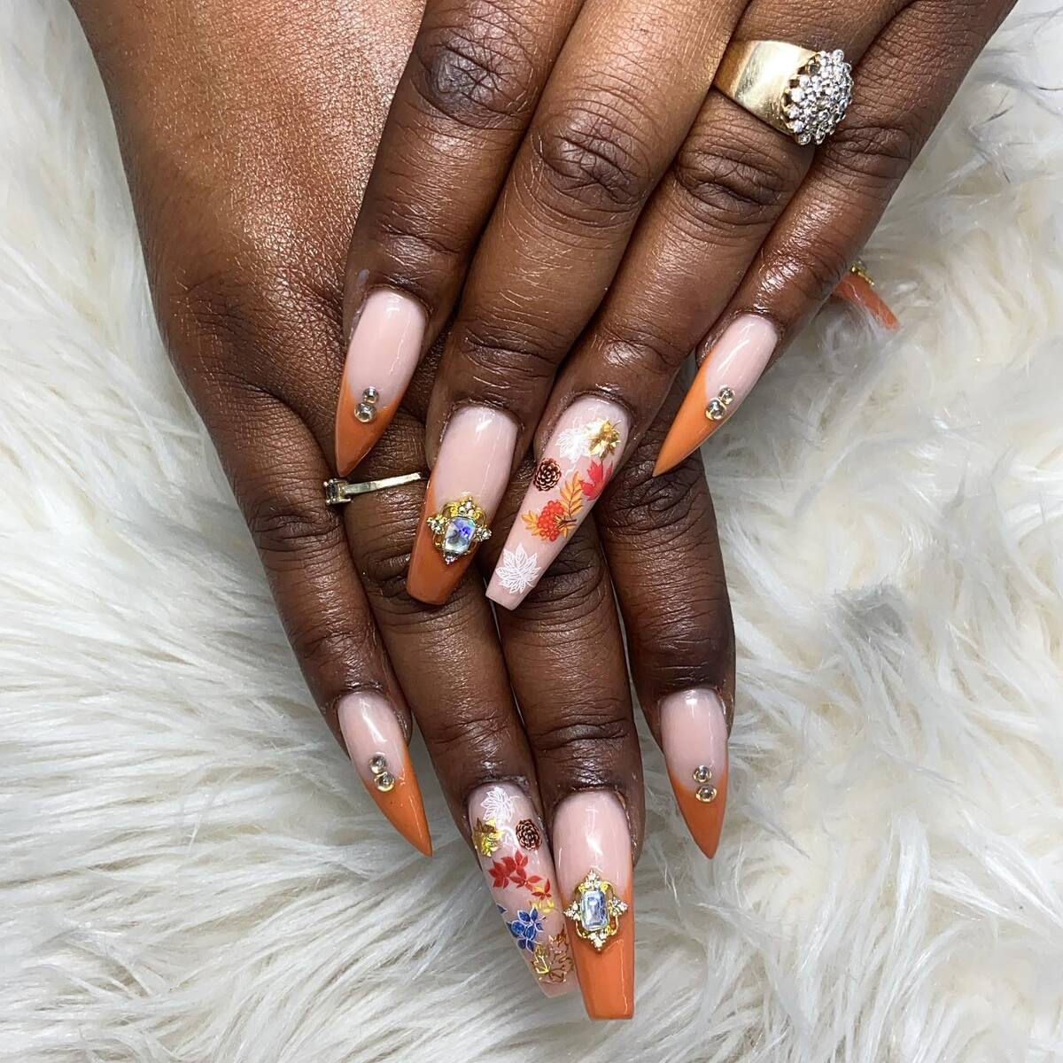 4. Pumpkin French Tips with Fall Florals