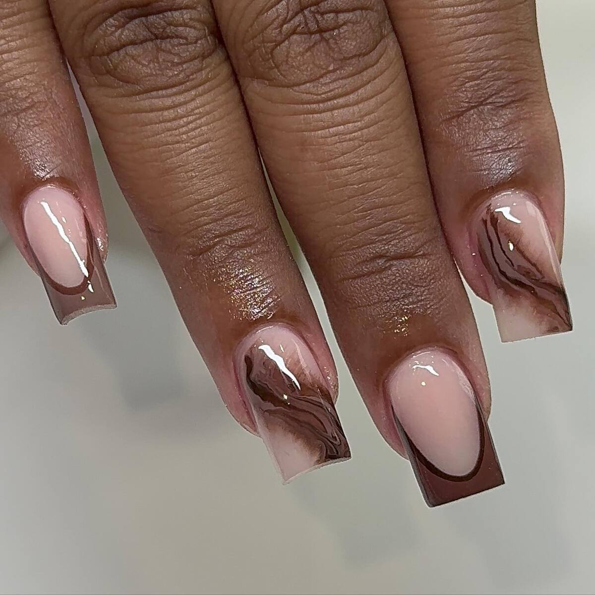 9. Cocoa Marble Tips with Glossy Finish