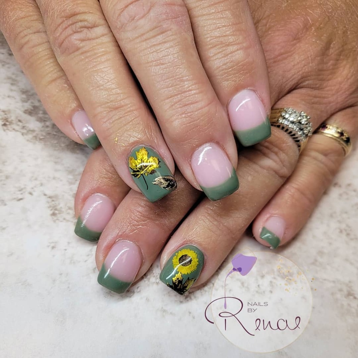 16. Soft Green French Tips with Autumn Floral Accents