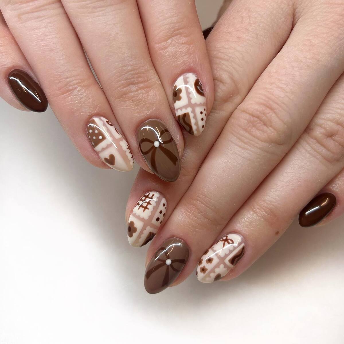 23. Cozy Chocolate Tones with Patchwork Patterns