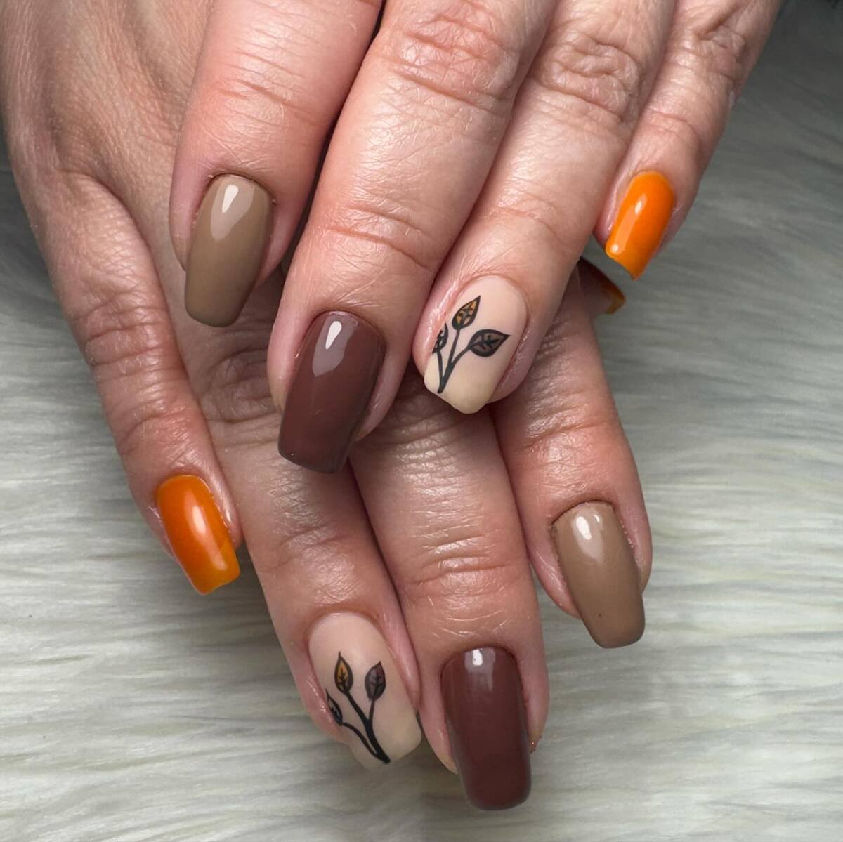 10. Earthy Neutrals with Minimal Leaf Accents