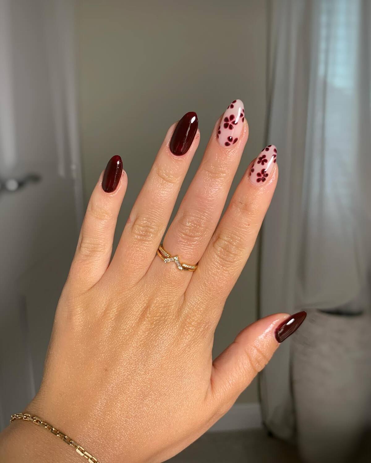 4. Deep Cranberry Elegance with Floral Accent