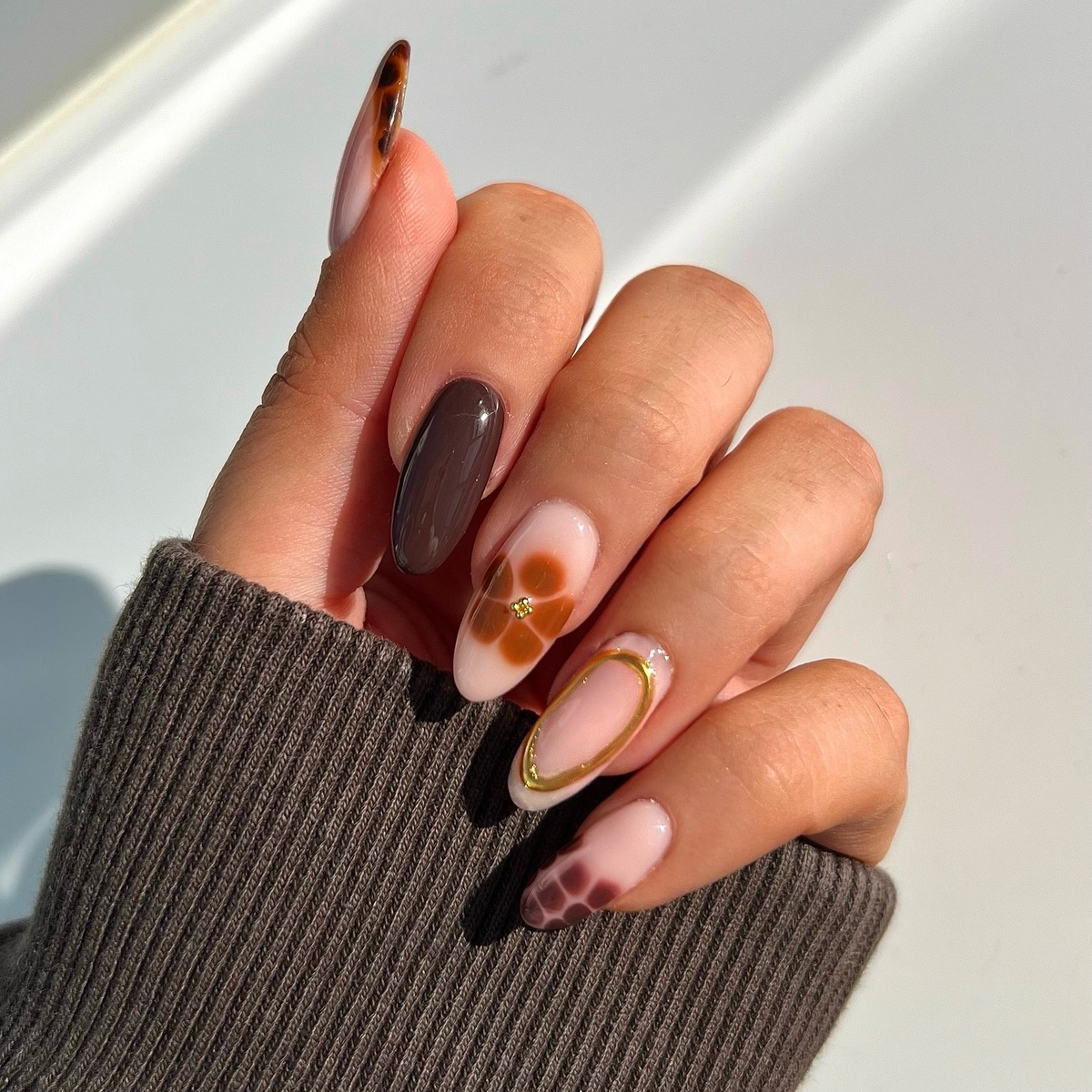5. Luxe Mocha Tones with Modern Artistry
