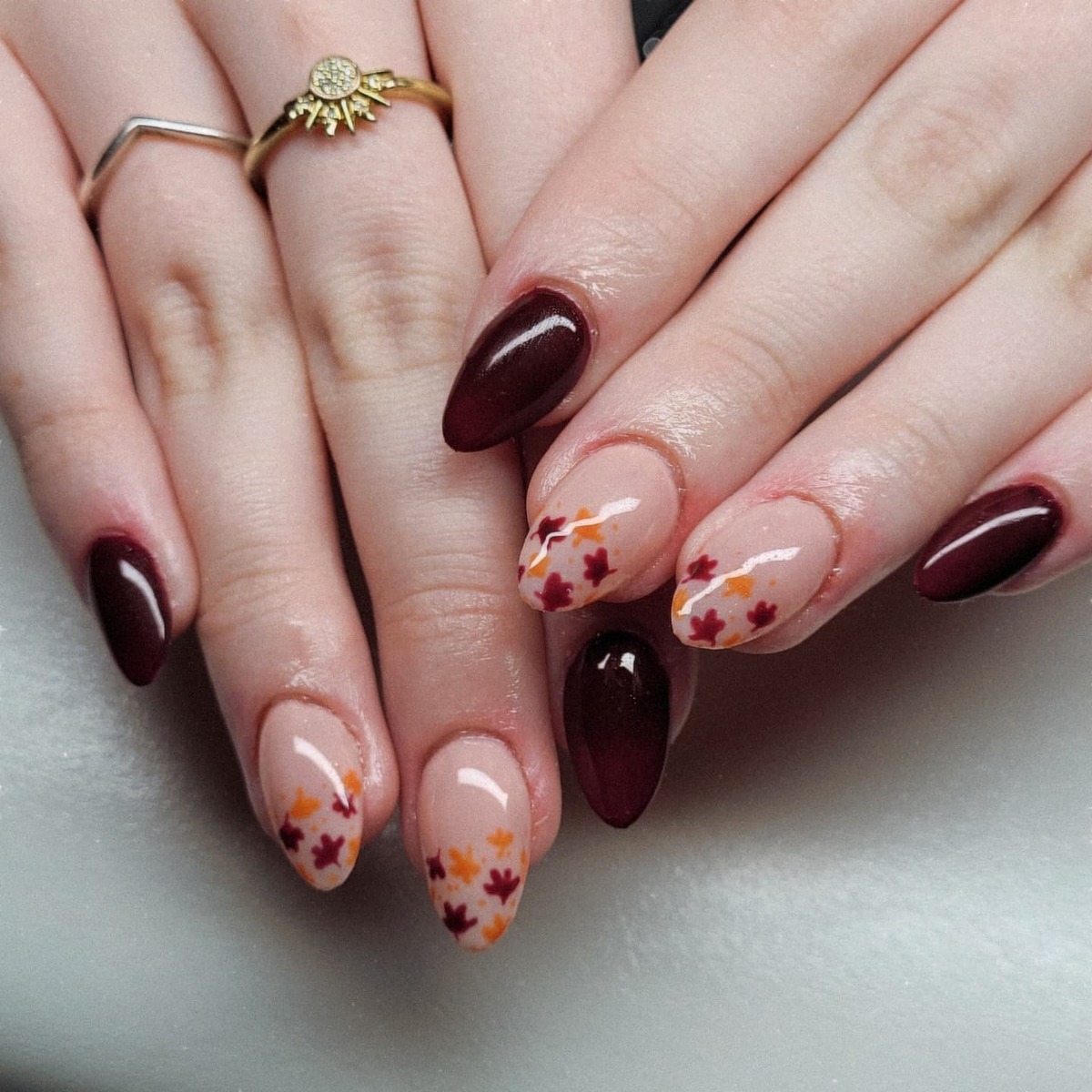 9. Burgundy Bliss with Falling Leaves