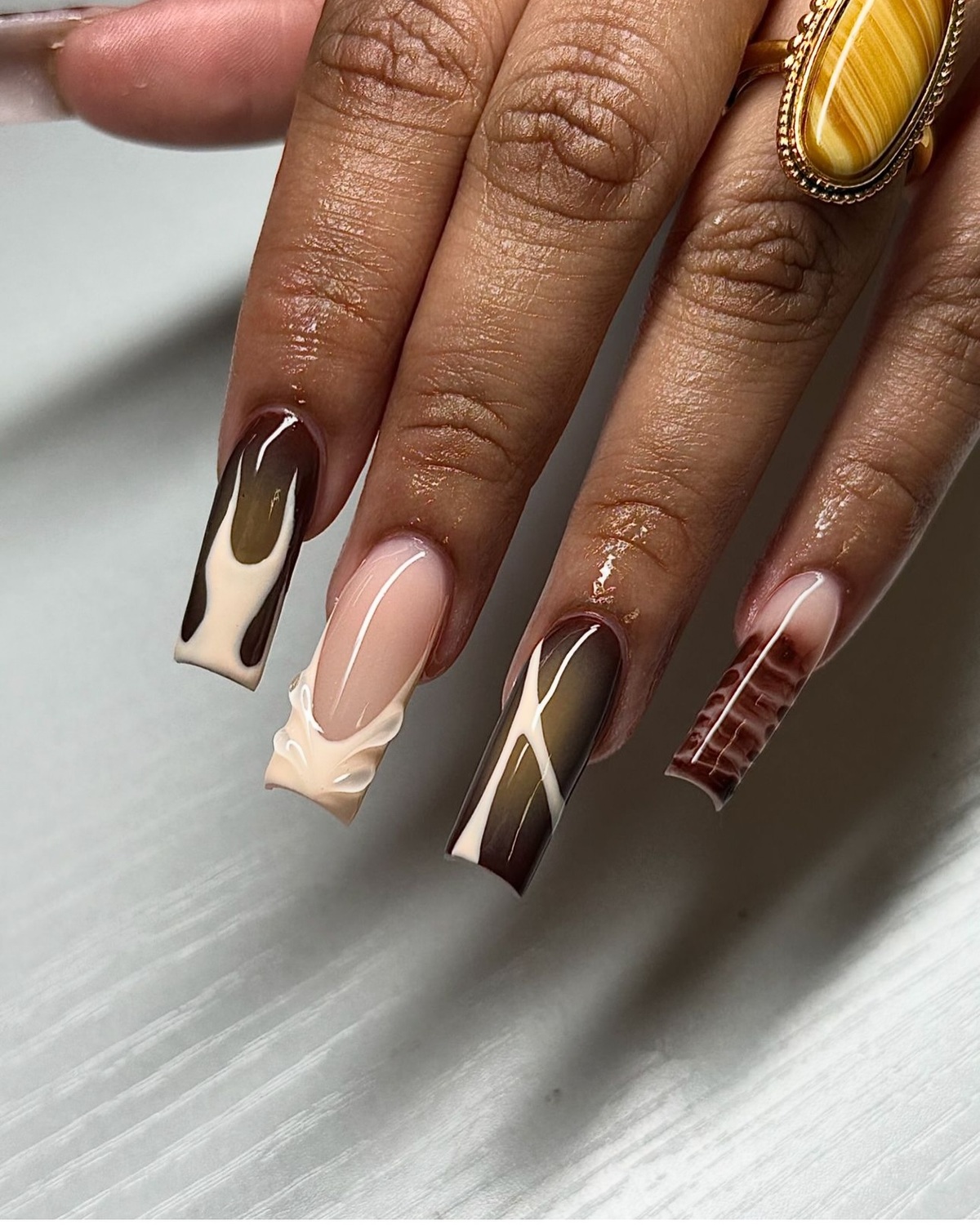 10. Mocha Swirls and Textured Neutrals