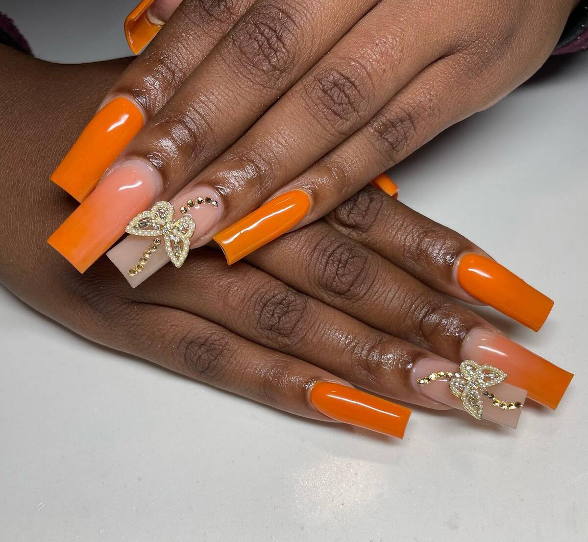 22. Fiery Orange Shine with Golden Leaf Accents