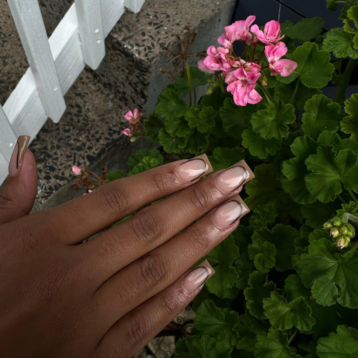 5. Subtle Taupe French Tips with a Modern Edge