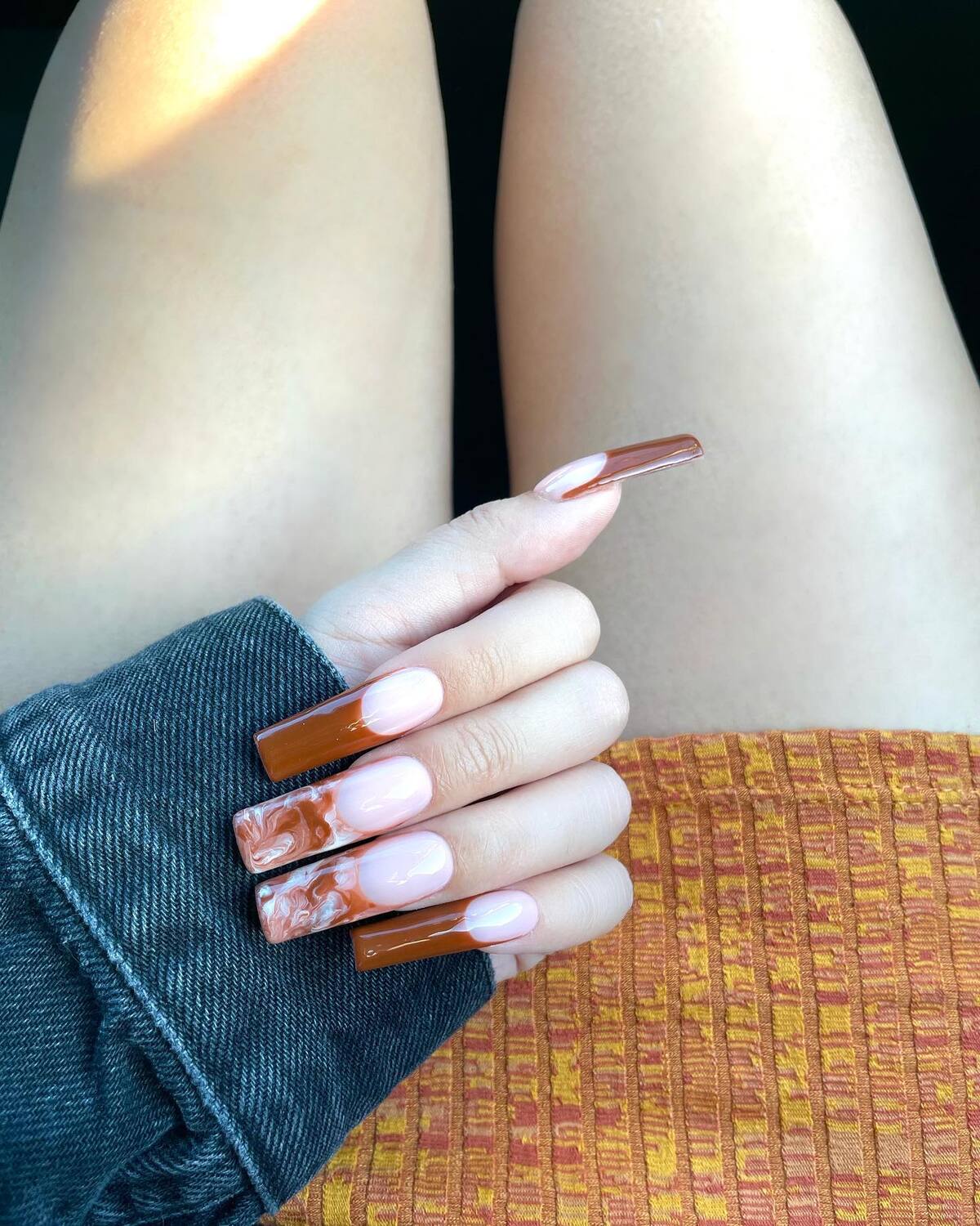 1. Rich Cinnamon Swirls with a Glossy Nude Base