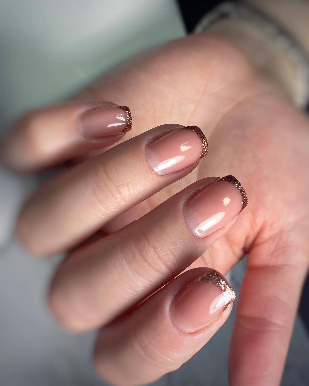 2. Subtle Sparkle with Bronze Glitter Tip