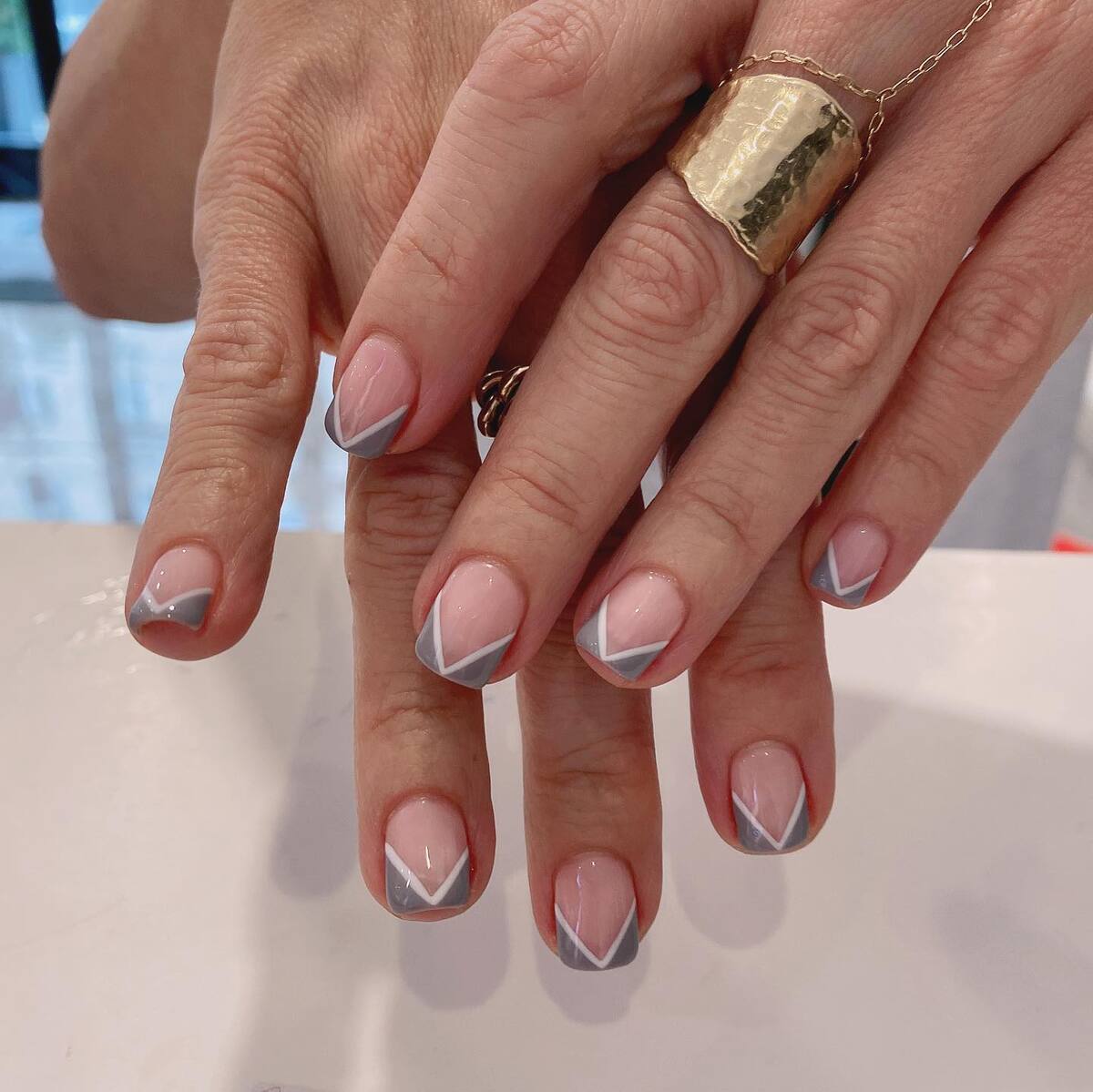 25. Geometric Grace With Cool-Toned Precision