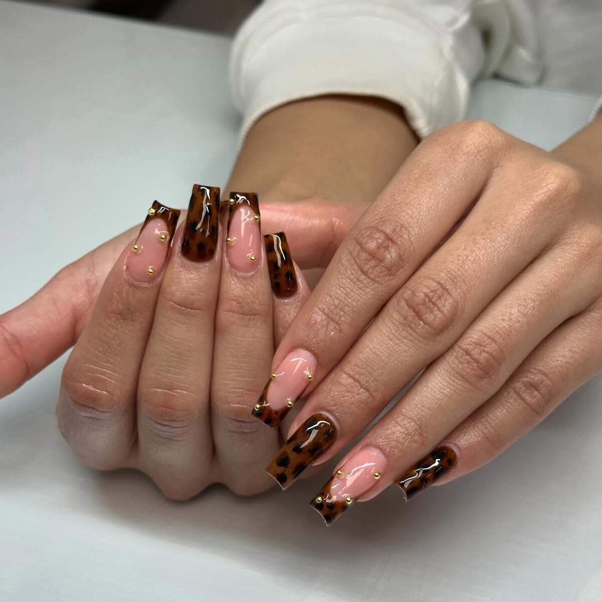 6. Wild Tortoiseshell Tips with Gold Stud Accent