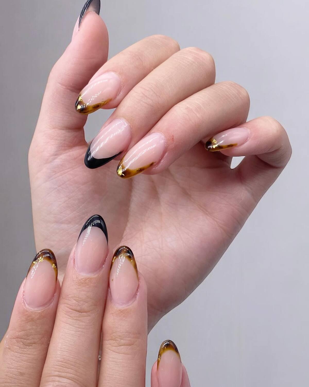 11. Smoky Tortoiseshell and Midnight French Tips