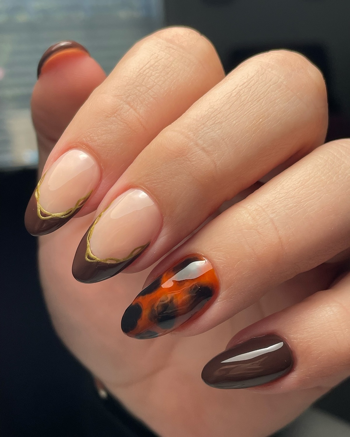 9. Molten Marble and Golden Swirls