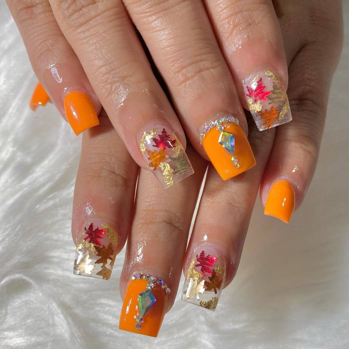 11. Vibrant Fall Leaves with Sparkling Jewel Accents