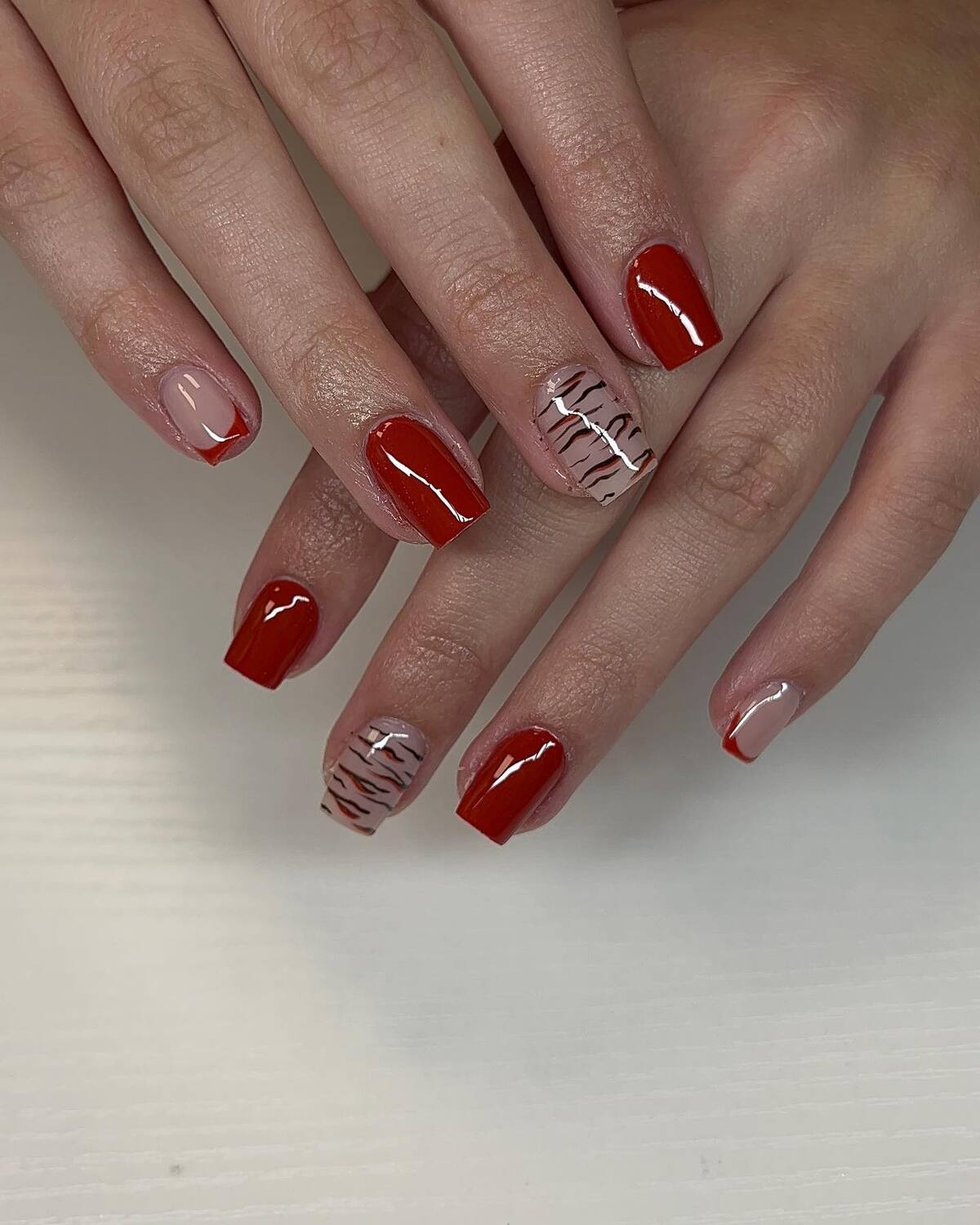 20. Fiery Red Meets Subtle Zebra Accents