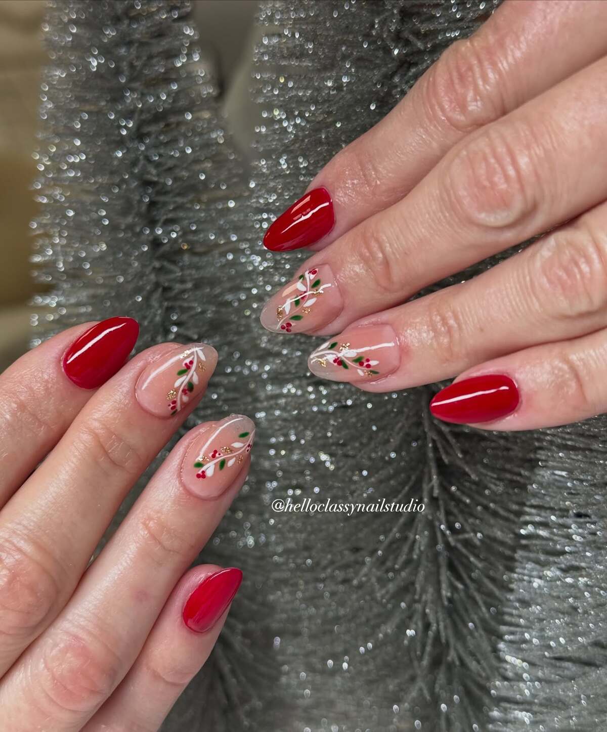 3. Almond Nails with Classic Red and Festive Holly Details
