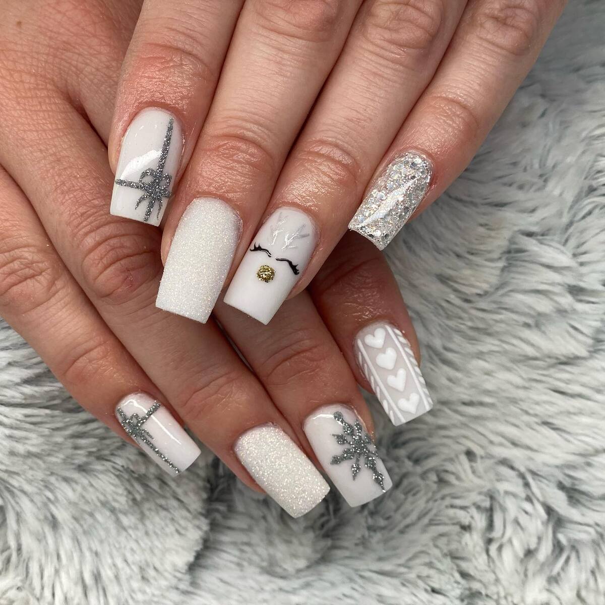 11. Sparkling Silver and White Christmas Nails