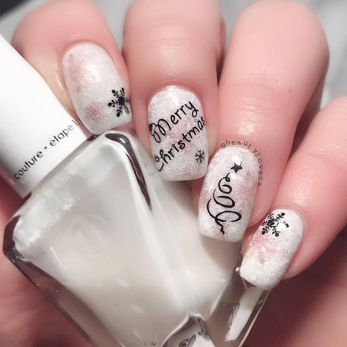 13. Merry Christmas Snowflake Nails