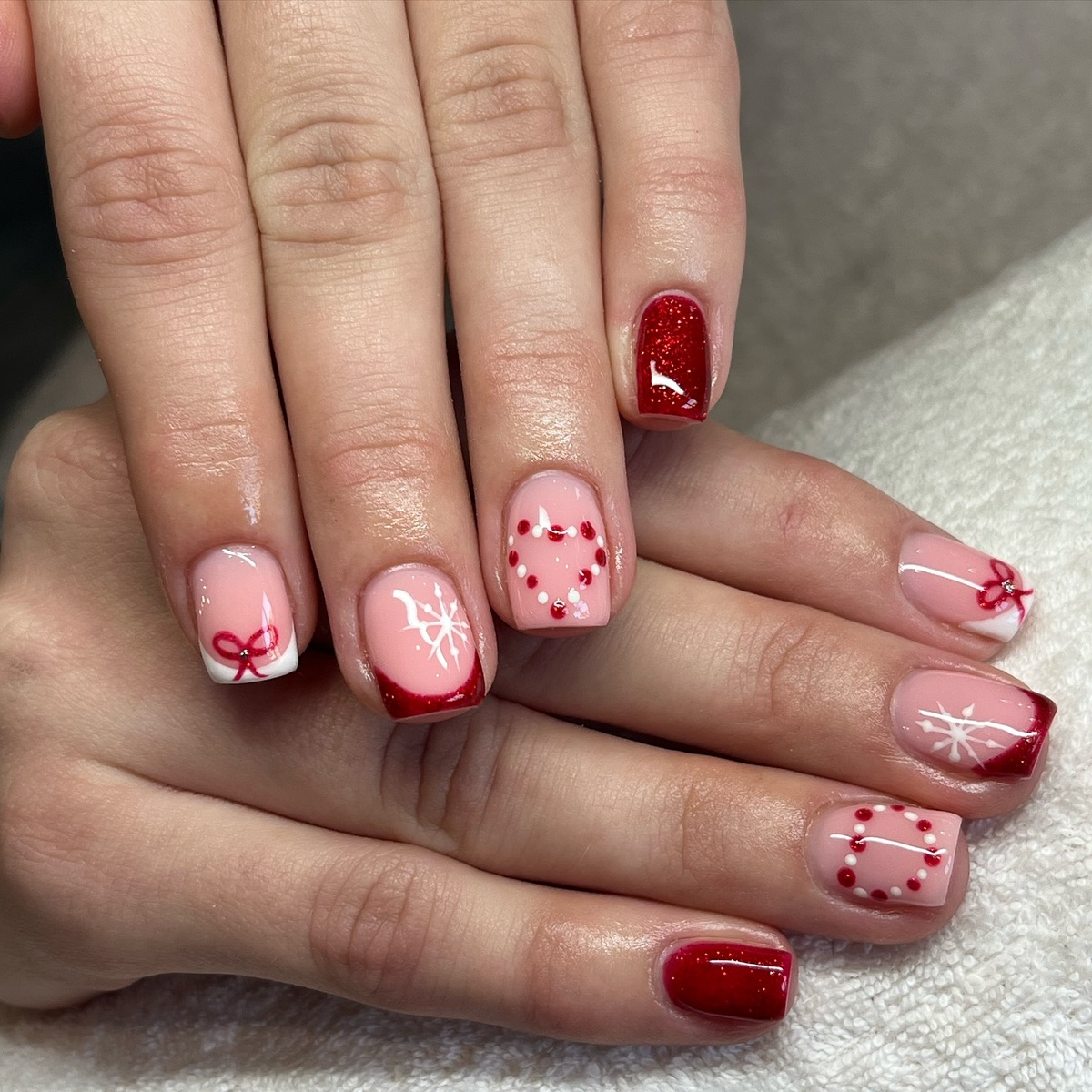 15. Festive Red and White Holiday Nails
