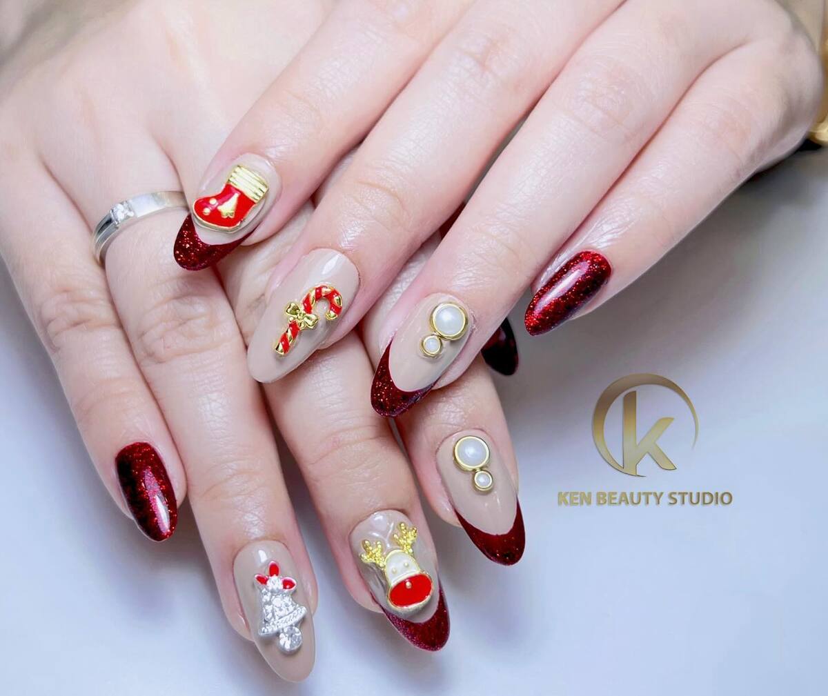 3. Glamorous Red Glitter Christmas Nails