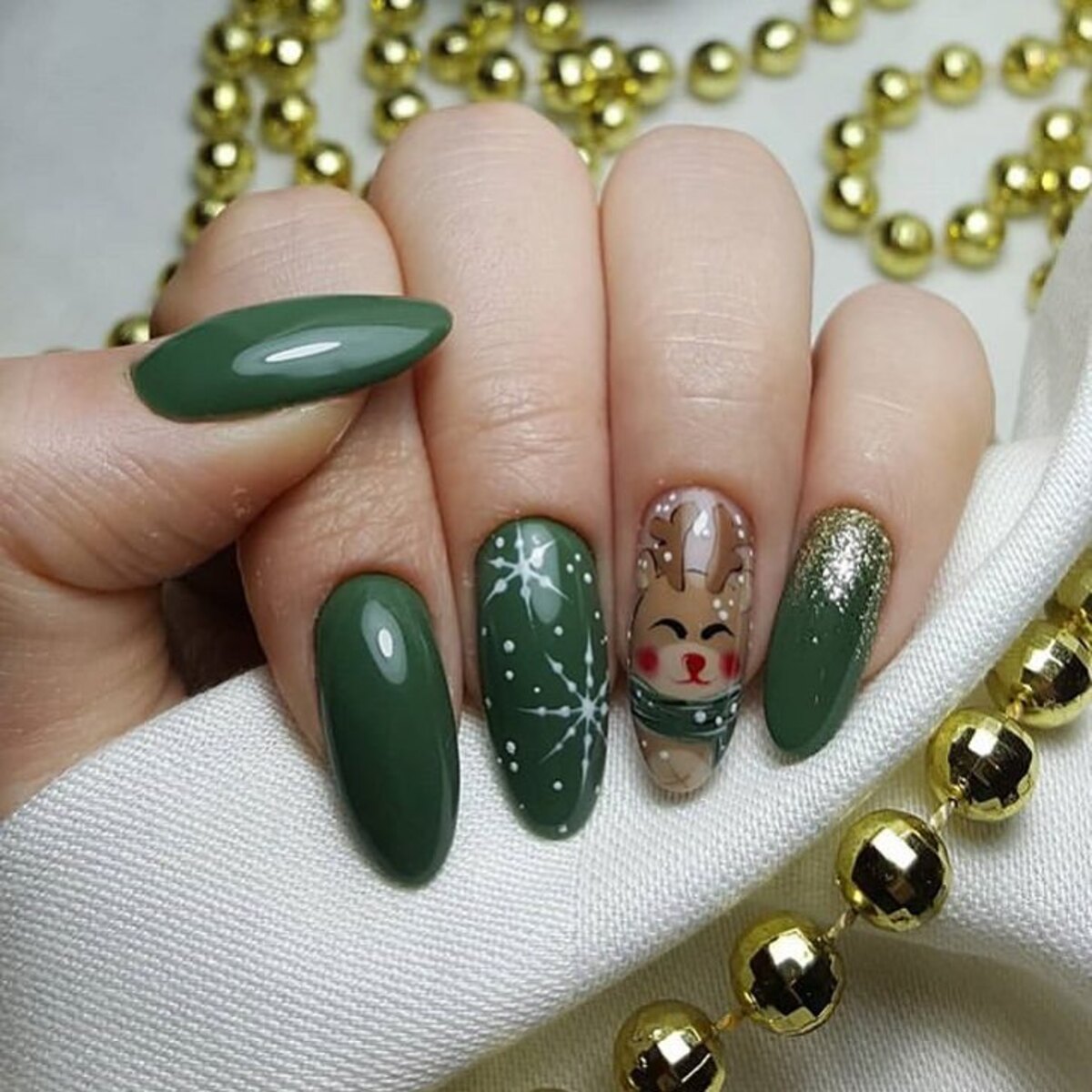 16. Cute Reindeer Christmas Nails