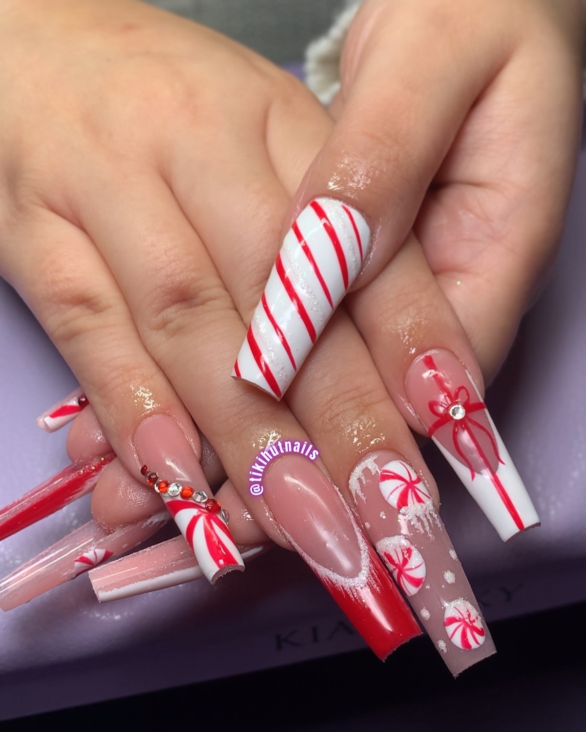 29. Peppermint Candy Christmas Nails