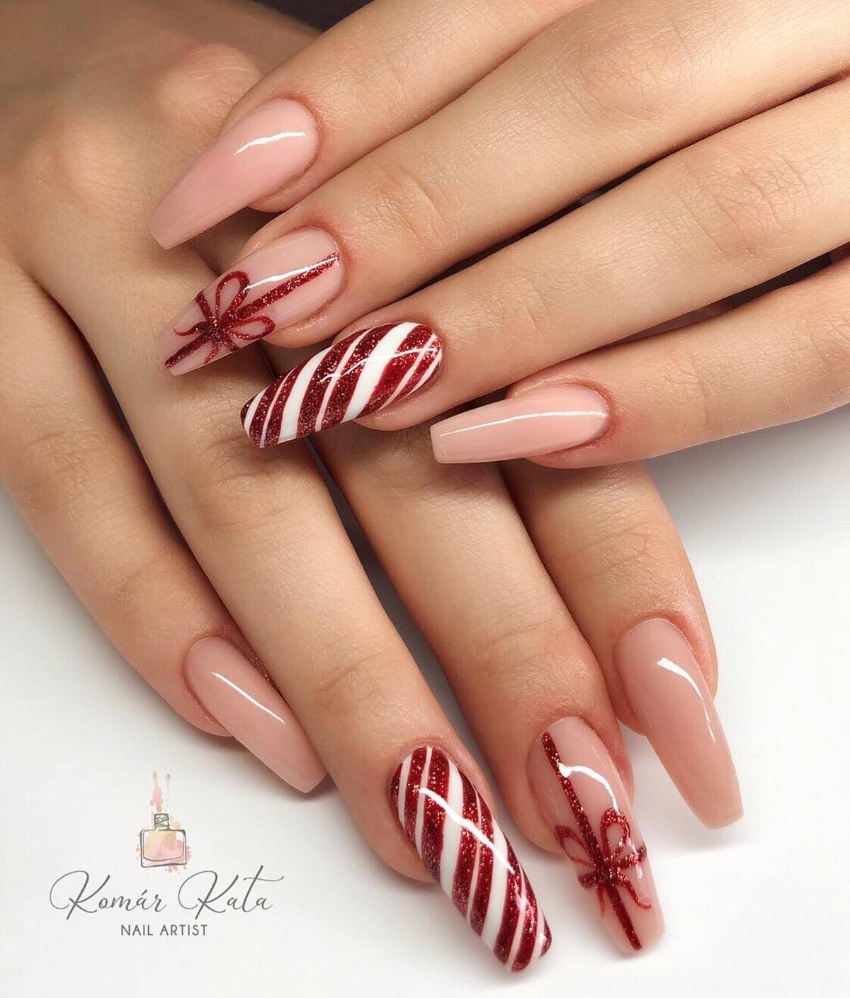 31. Candy Cane & Gift Wrap Christmas Nails