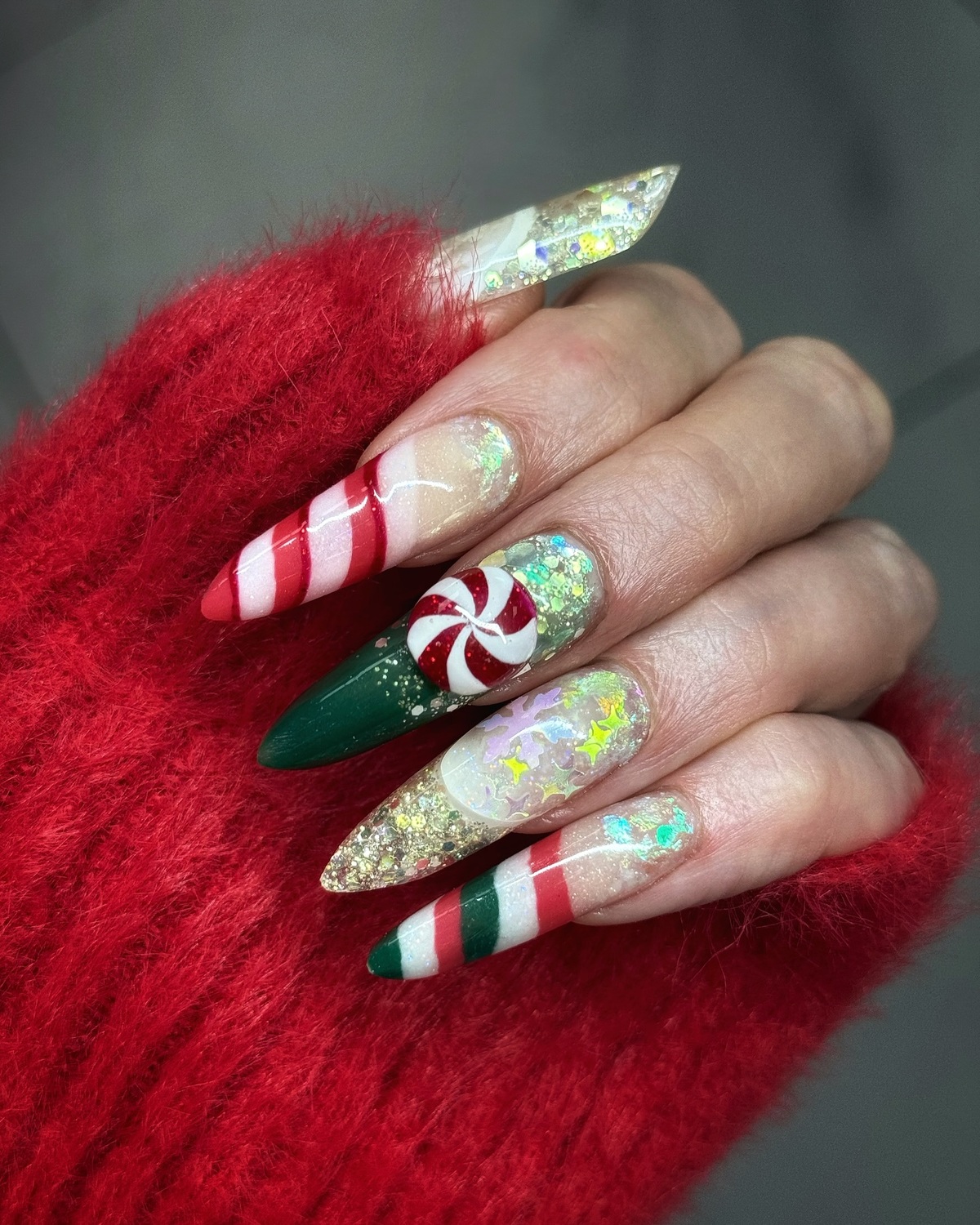 10. Peppermint Candy Christmas Acrylic Nails