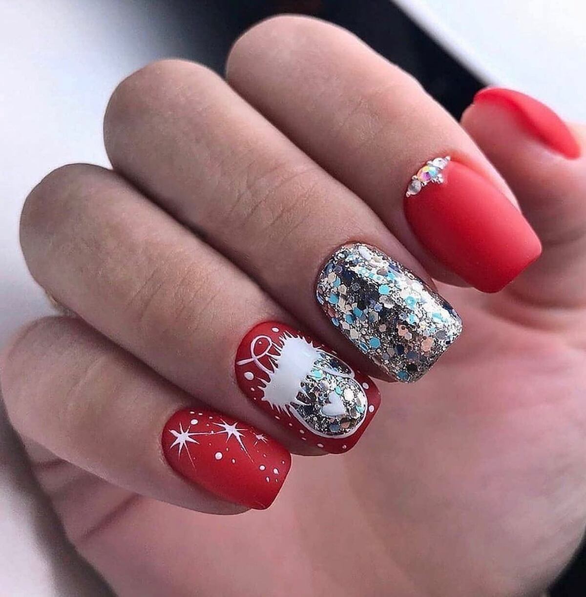 24. Red and Silver Glitter Christmas Acrylic Nails