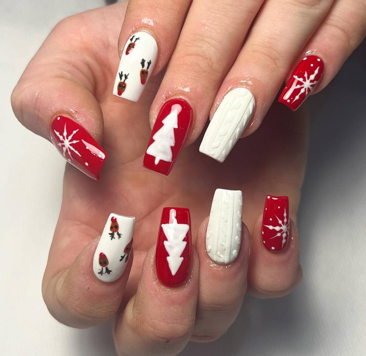 28. Festive Red and White Christmas Acrylic Nails