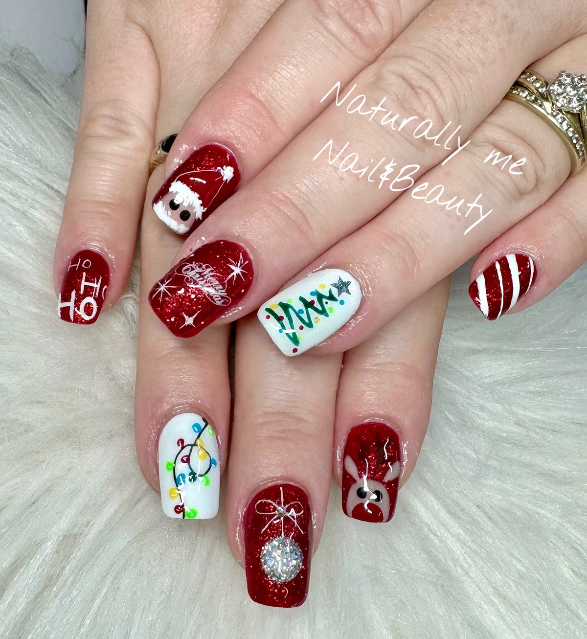 3. Festive Acrylic Nails with Christmas Characters